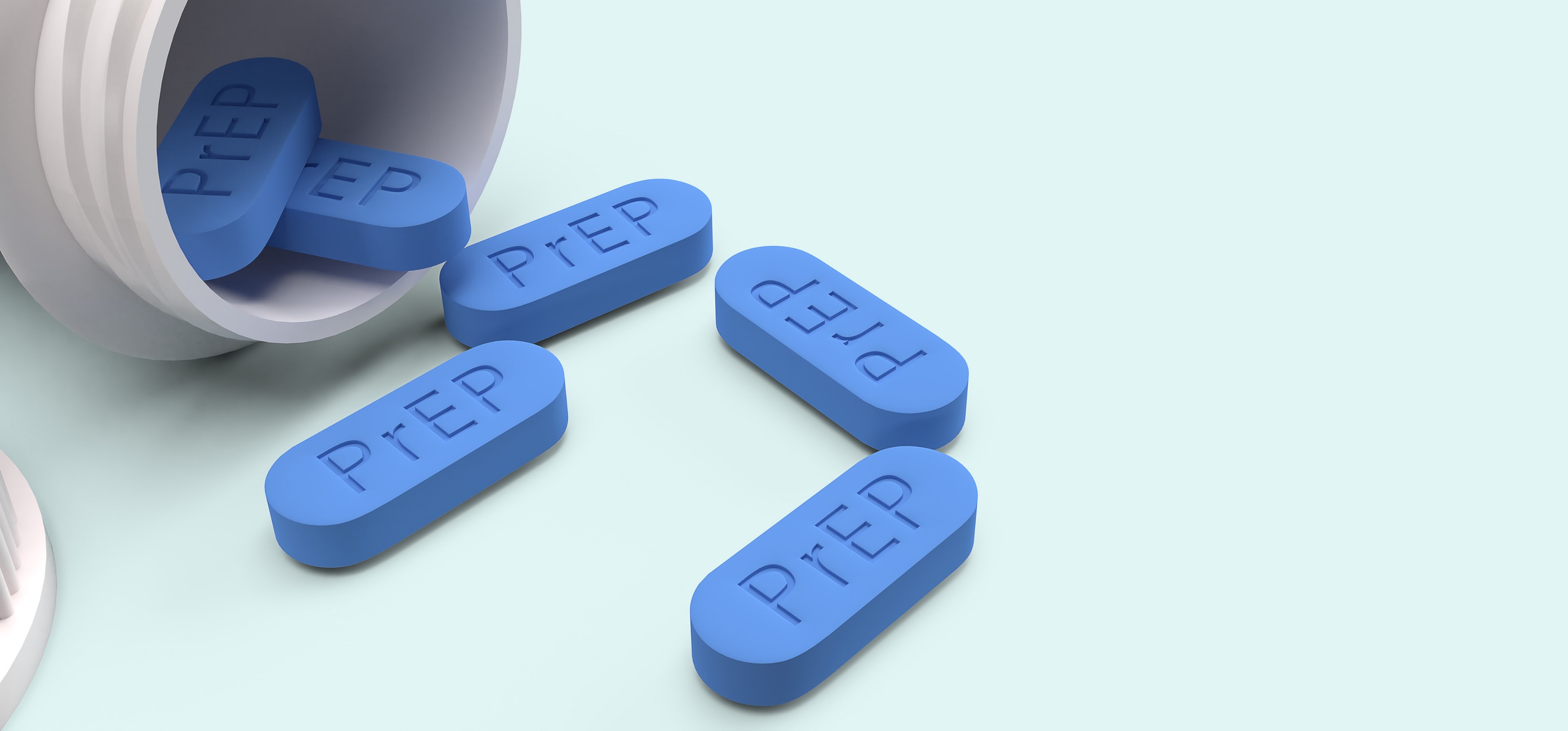 Pills labeled PrEP spill out of a pill bottle